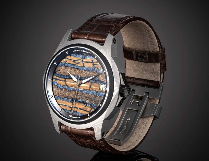 Hand-forged Damascus wristwatch with fossil Woolly Mammoth dial, by William Henry